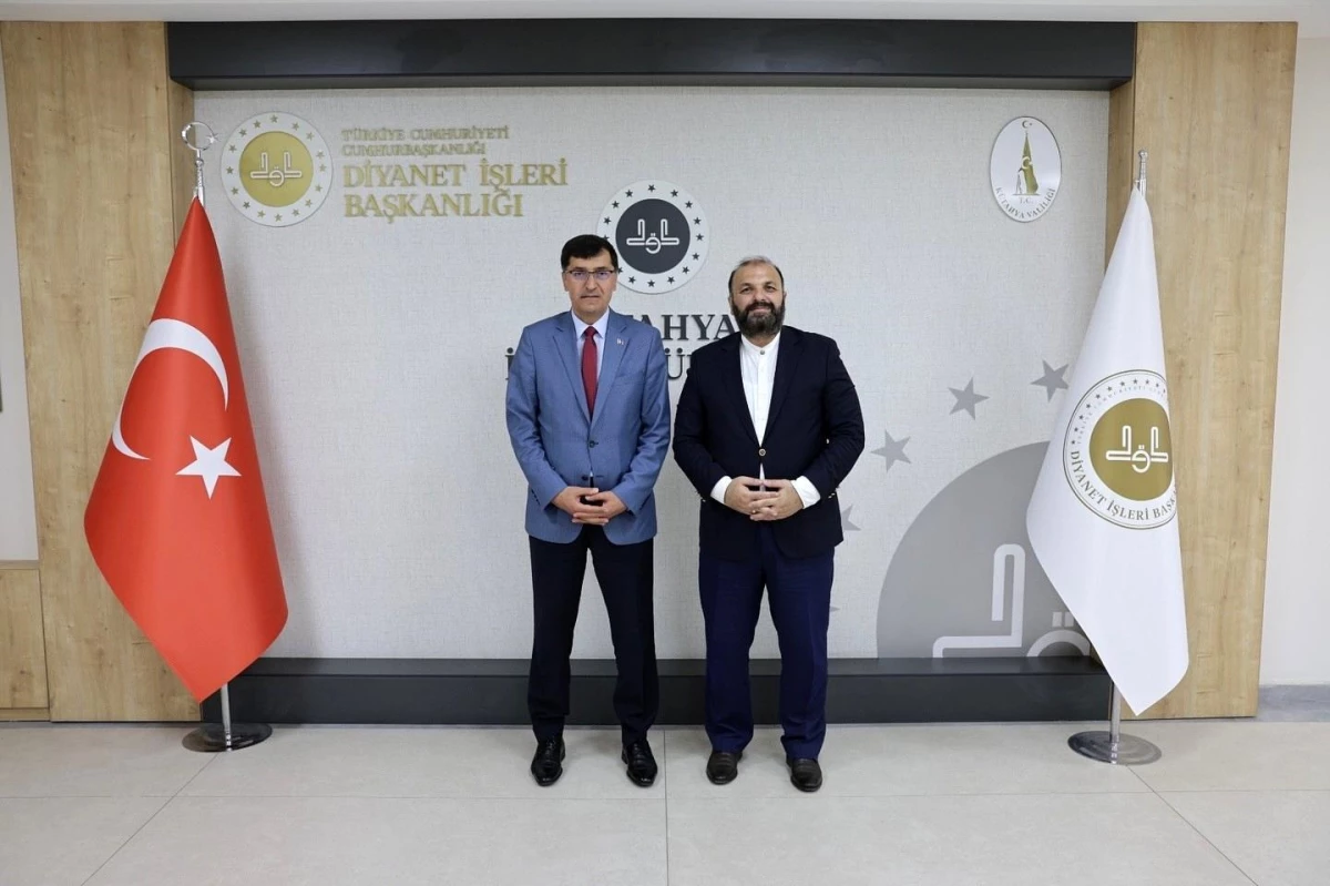 Kütahya Belediye Başkanı Eyüp Kahveci, Müftü Dr. İrfan Açık’ı ziyaret etti